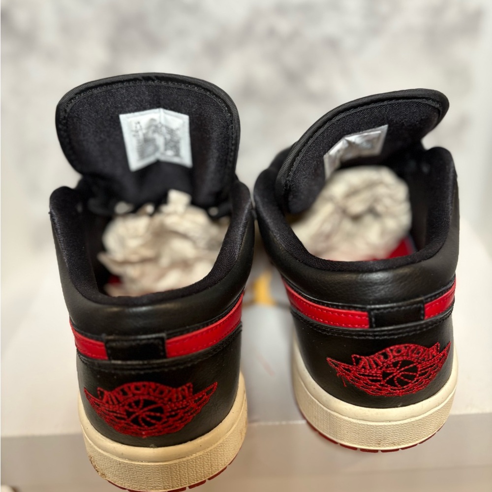 Air Jordan Retro 1 Low Top Black and Red Sneakers